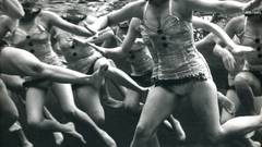 Woman grayscale swimming underwater