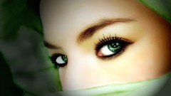 Woman green eyes hijab