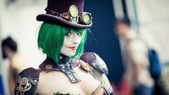 Woman green hair cleavage cosplay top hat steam punk