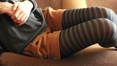 Woman Headless couch striped legwear body parts