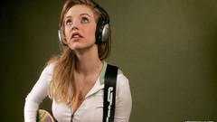 Woman headphones Kelli Garner