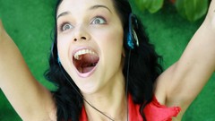 Woman headphones mouth shout smiling ukrainian Katie Fey