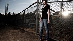 Woman jeans sunlight brunettes Chain Link Fence Taylor 