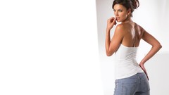 Woman jeans white background brunettes looking back necklaces 