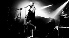 Woman lights stage guitars singers grayscale Kyla La Grange