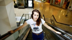 Woman long hair blue eyes brunettes Escalators mall