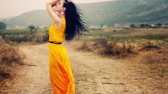 Woman long hair brunettes yellow dress fashion photography 