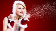 Woman models Christmas outfits blowing