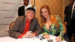 Woman models cleavage Hugh Hefner Sharpie marker Jordan Carver