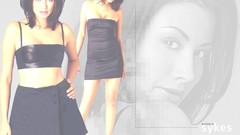 Woman models cleavage Melanie Sykes