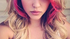 Woman models dyed big tits