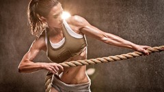 Woman models fitness gym weight lifting