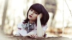 Woman models Neon Lynxie