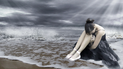 Woman ocean clouds sunlight