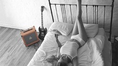 Woman orange panties amplifiers gibson guitar
