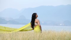 Woman outdoors samantha back view indian looking up yellow 