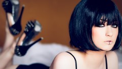 Woman piercings black hair high heels Lolina Green Niky Macabre