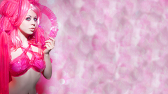 Woman pink bra pierced