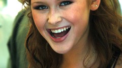 Woman redheads smiling singers