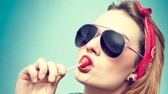 Woman Ribbons sunglasses earrings blondes lollipops sucking