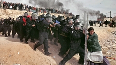 Woman riots police protest