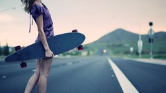 Woman roads Longboarding