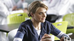 Woman scrubs Eliza Coupe