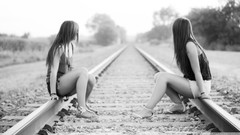 Woman Shorts railway grayscale looking away