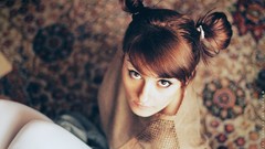 Woman sitting brown eyes brunettes little girl looking up 