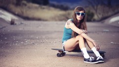 Woman Skateboarding sunglasses legs tattoos brunettes 