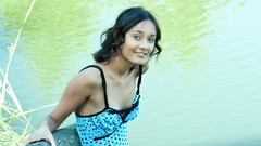 Woman smiling blue eyes models black hair curly hair girls in 