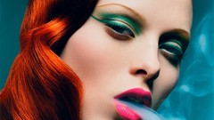 Woman smoke lips blue background faces fashion eye shadow 