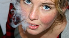 Woman smokes smoking blue eyes freckles freckle Blonde and Mild
