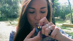 Woman smoking smoking pipe