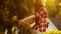 Woman sunbathing plaid shirt