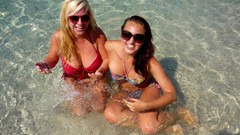 Woman sunglasses blondes brunettes bikini curly hair huge boobs 