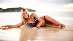 Woman surfing bikini Alana Blanchard