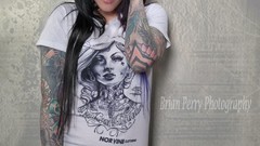 Woman tattoos blue eyes black hair Chelsey Mac