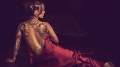 Woman tattoos Brian Cummings