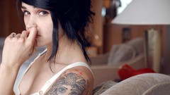 Woman tattoos couch brunettes inked