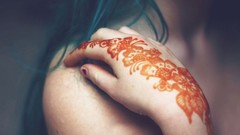 Woman tattoos Henna