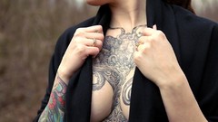 Woman tattoos models cleavage boobs black clothes sideboobs