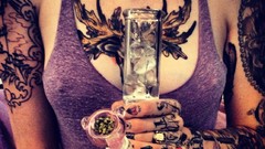 Woman tattoos nude boobs nipples through clothing bong