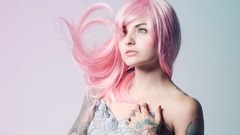 Woman tattoos pink hair inky