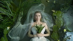Woman Water Lilies Kirsten Dunst Actress Melancholia lily pads 