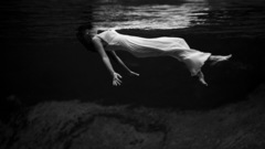 Woman water swimming float