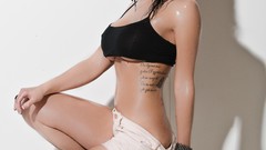 Woman wet tattoos soft skin