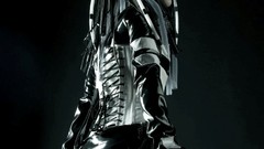 Woman whips PVC gothic