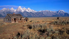 Wooden House and Mountains