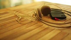 wooden surface Technology blurred macro headphones